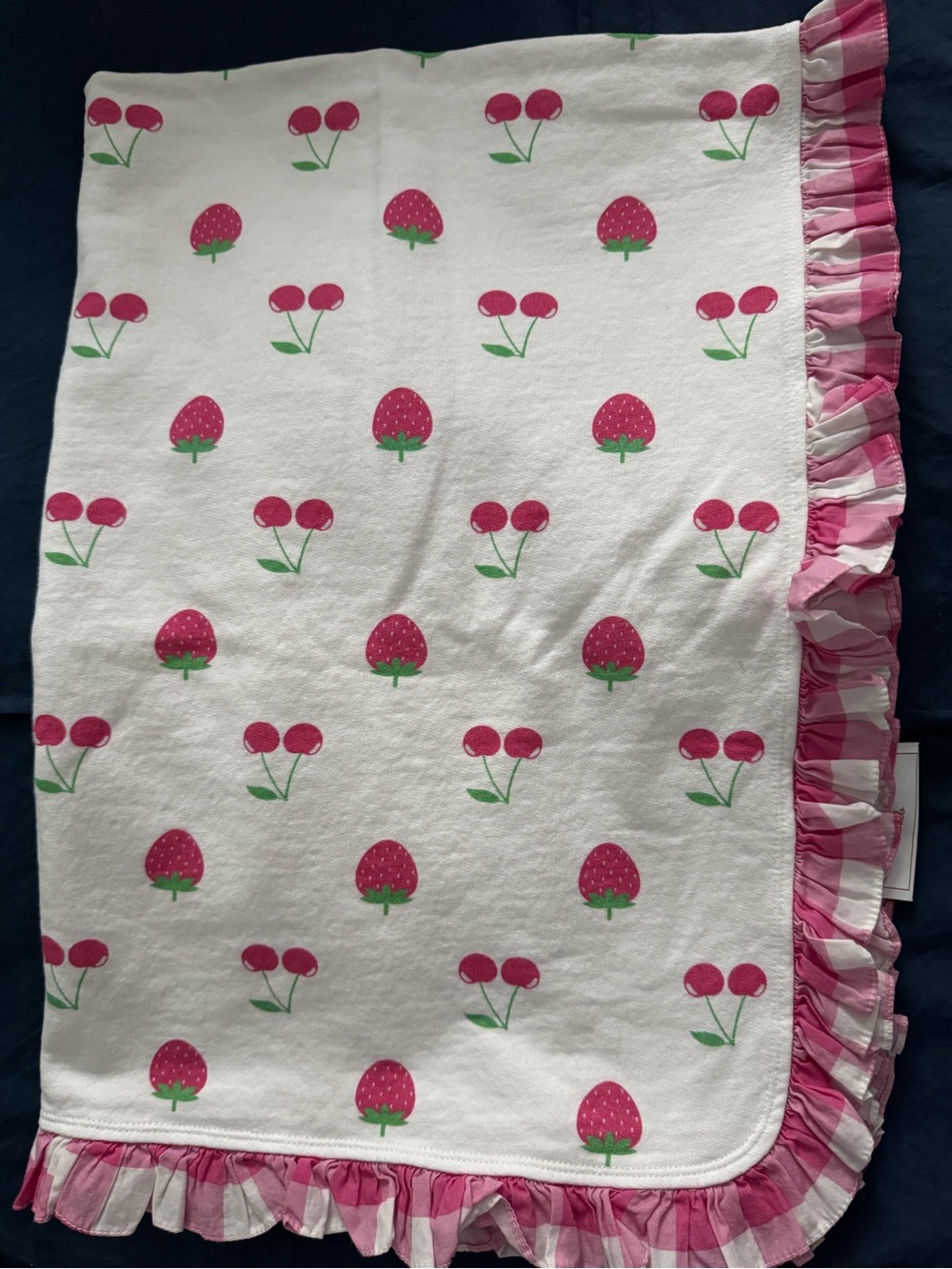 Sal & Pimenta pink ruffled fruit-patterned blanket or towel